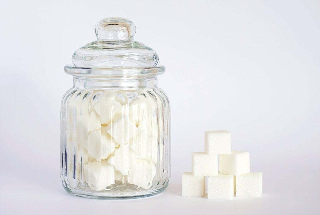close-up-photo-of-sugar-cubes-in-glass-jar-2523650