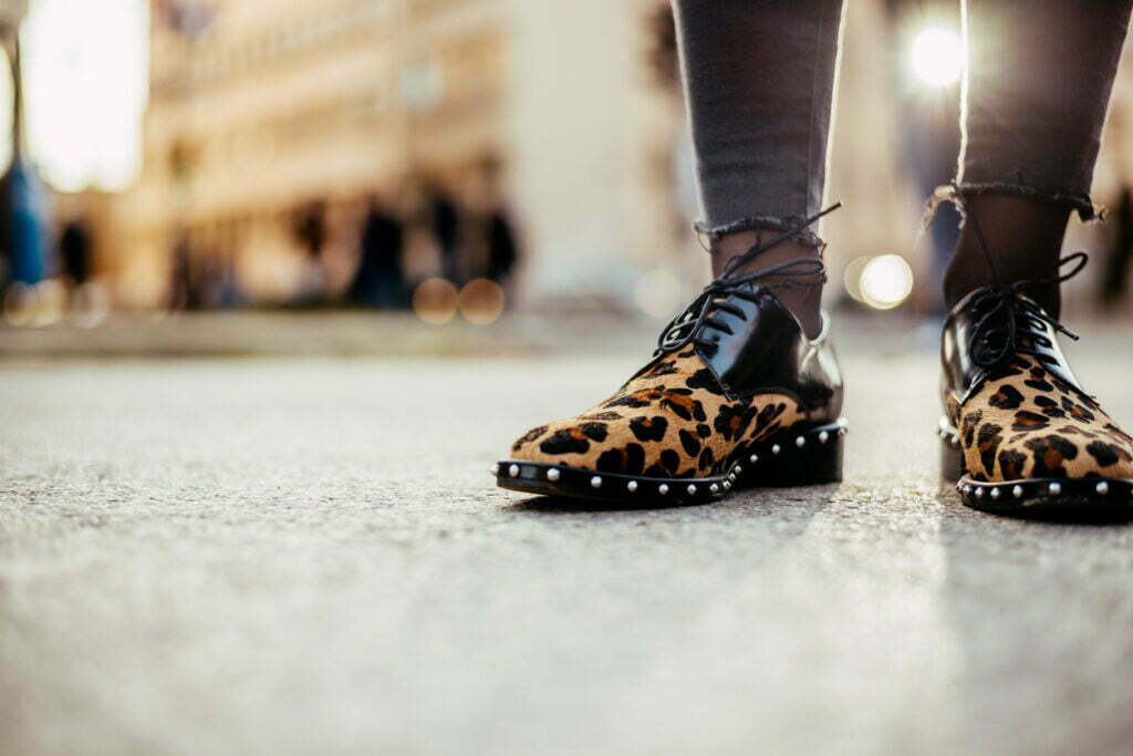 Girl in leopard print flat shoes.
