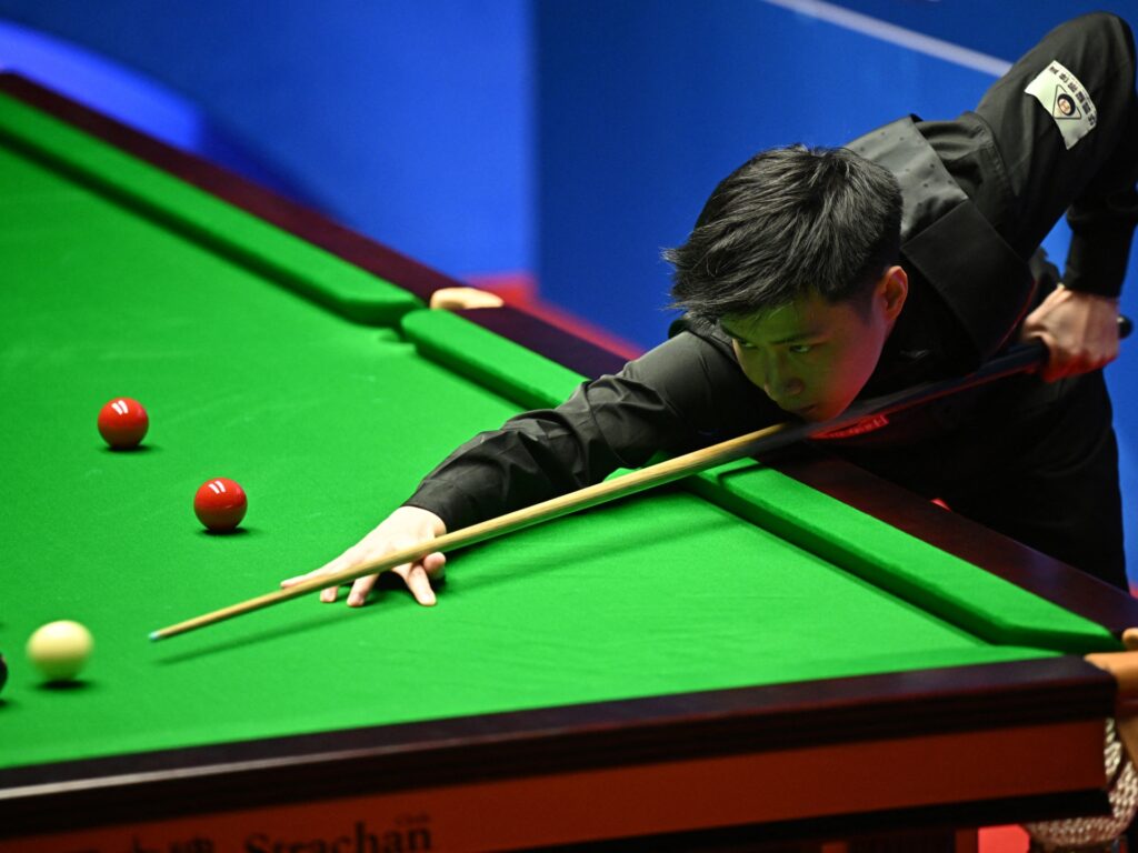 Zece jucători chinezi de biliard loviți de acuzații de aranjare