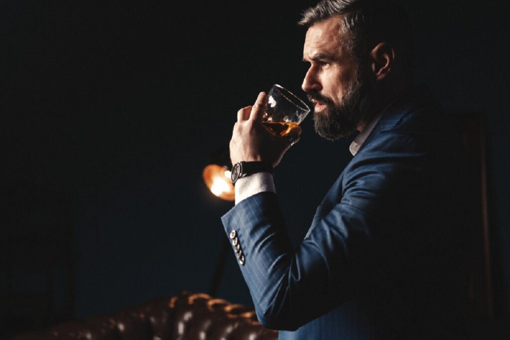 Degustation,,Tasting.,Man,With,Beard,Holds,Glass,Of,Brandy.,Tasting