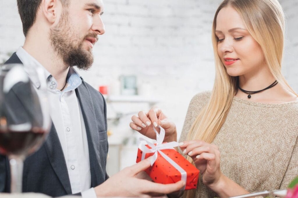 woman-opening-gift-box-from-boyfriend